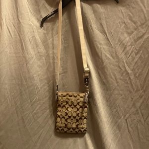 Brown Coach cross body bag